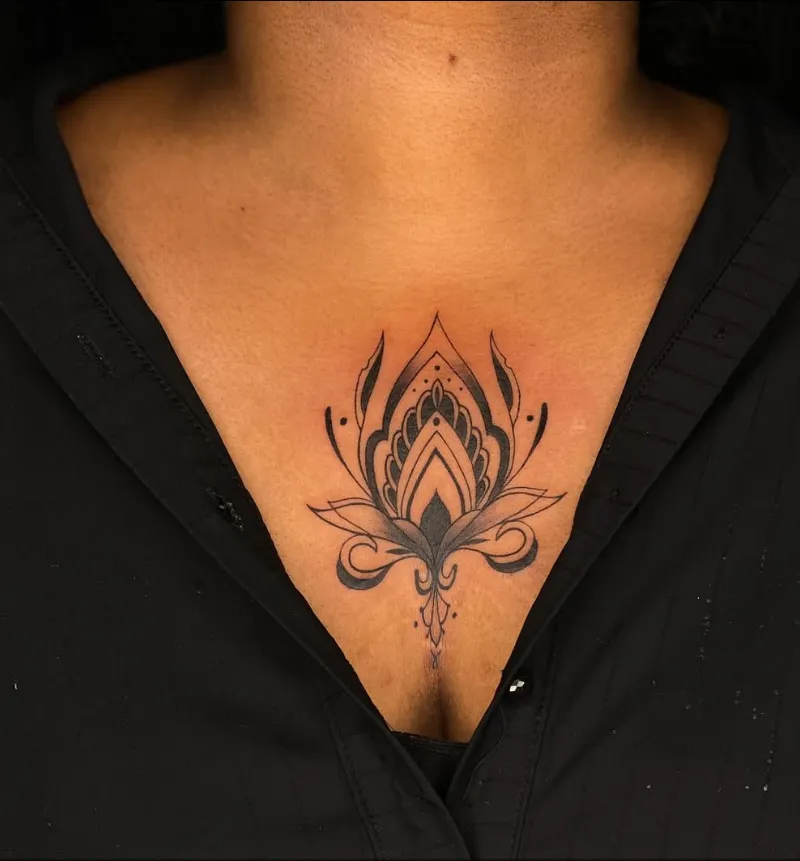 Intricate symmetrical lotus mandala dotwork tattoo